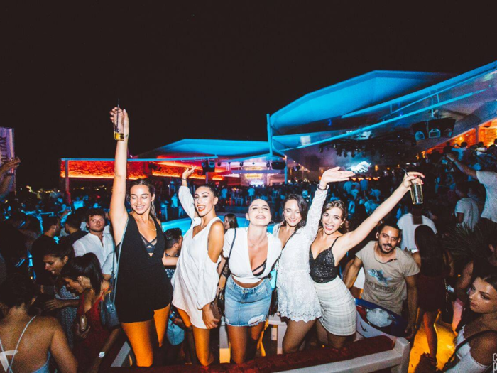 But the day is just getting started — the real fun begins with a night at Cava Paradiso, a nightclub on a rocky bluff overlooking Paradise Beach. With an oversized swimming pool and a super-disco, it attracts celebrities and well-known DJs ($54,900 for three tables).