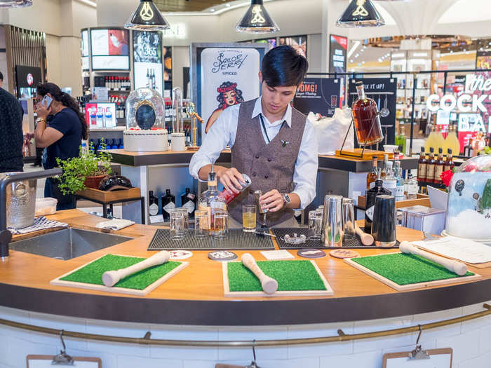 That said, the duty-free section has a cocktail bar where a bartender will mix up complimentary cocktails using the different alcohols you can buy. Bottoms up.