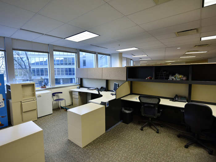 More standard office equipment is spread through the eerily empty cubicles.