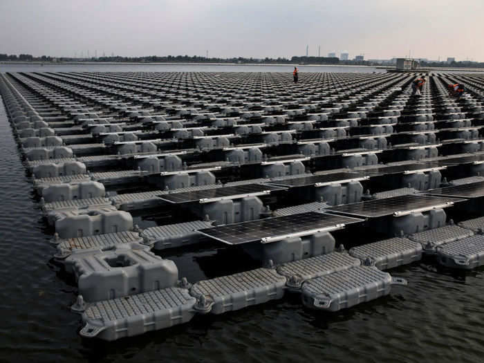 Floating solar farms use flotation devices, seen below, which help it stay above water.