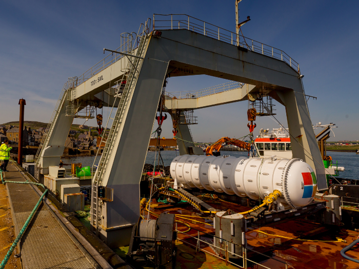 When it was time to put the data centre in the sea, it was attached to a ballast-filled base and towed out into the water.