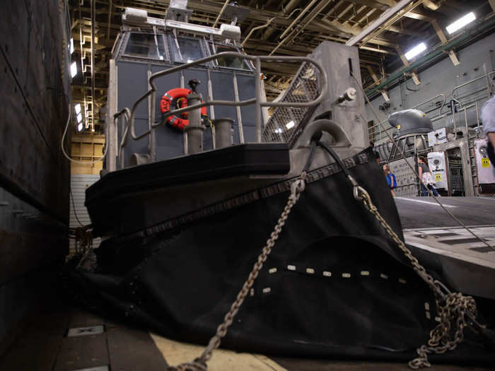 The LCAC is basically a hovercraft, which inflates before taking vehicles and marines ashore.