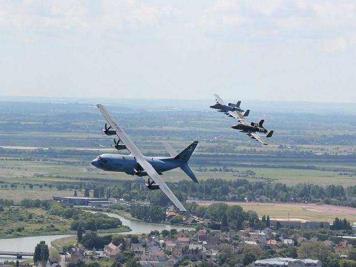 The two A-10s flew with multiple C-130s over Normandy as well.