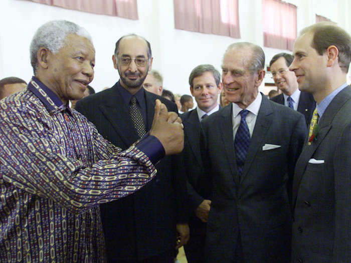 2000: Prince Philip bids farewell to Former President Nelson Mandela. Prince Philip and Prince Edward went to see young offenders enrolled in rehabilitation programs in South Africa.