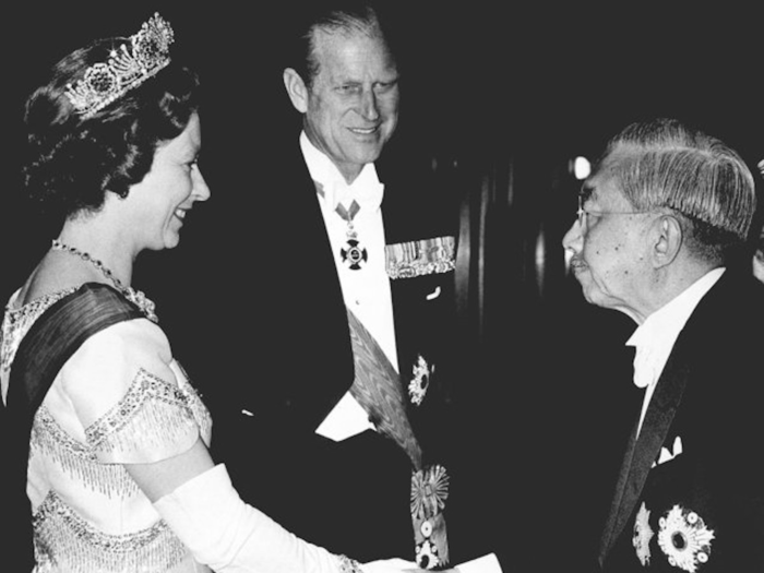 1975: Queen Elizabeth II and Prince Philip are greeted by Emperor Hirohito of Japan at the entrance of the Imperial Palace in Tokyo on May 7, 1975.