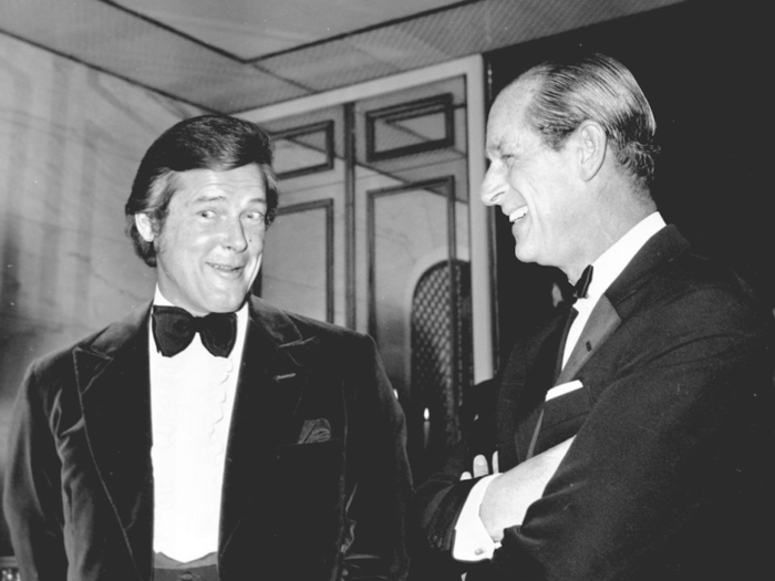 1971: The late Sir Roger Moore met the Duke of Edinburgh at an auction dinner in aid of the Variety Club of Great Britain, at the Savoy Hotel in 1971.