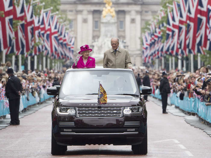 ...and has made countless public appearances. In this image, the people of London wave to the couple in celebration of the Queen