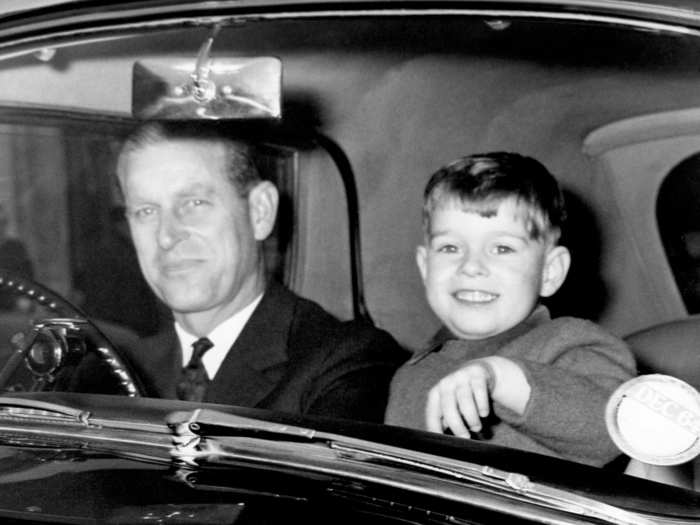 Prince Andrew looked pleased to be riding with his father to Windsor Castle for Christmas in 1964.