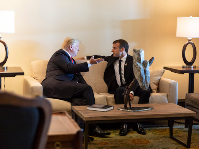 Trump spoke with Macron one-on-one, and neither looked especially happy.