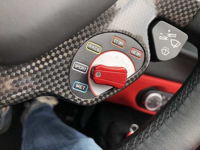 The carbon-fiber, leather-wrapped steering wheel features the famous Ferrari manettino, which selects driver modes. I stuck with Sport and Race mode and didn