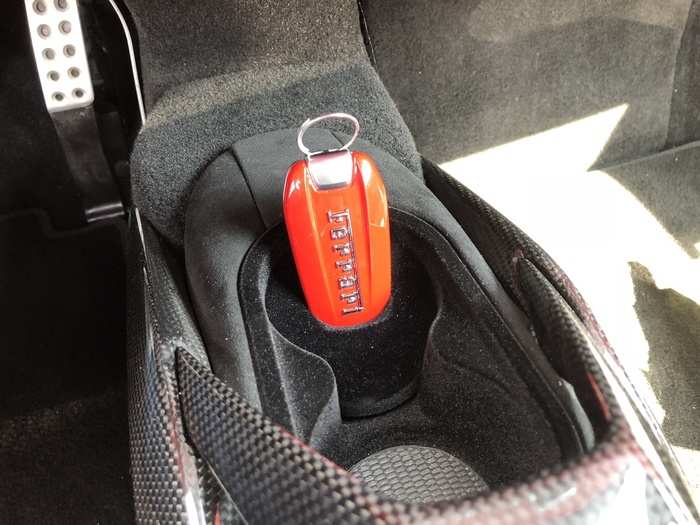 There is one — but your cup will block the view the exquisite Ferrari fob in its fob-holder.