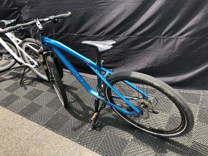 At races, the teams use an assortment of alternative ways to get around. Such as these BMW bikes.