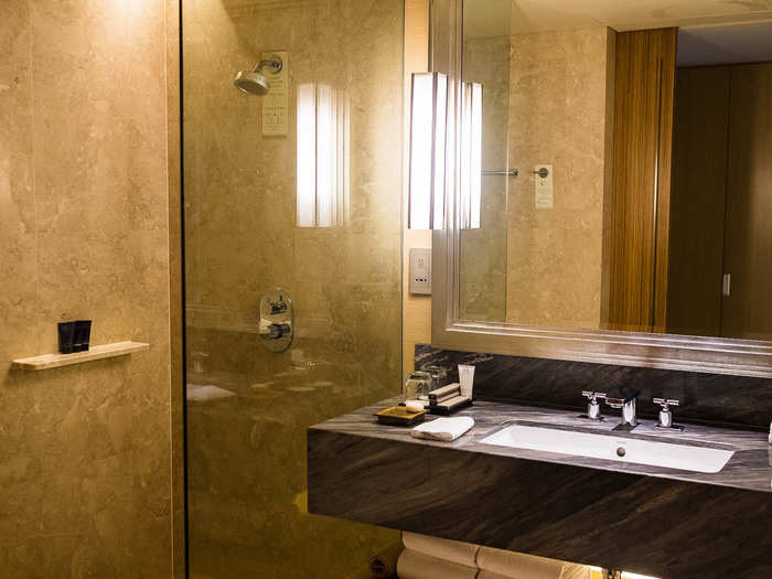 For a top-of-the-line luxury hotel, the bathroom left a lot to be desired. The shower-head was broken, spraying water every which way, and only got to a lukewarm temperature.