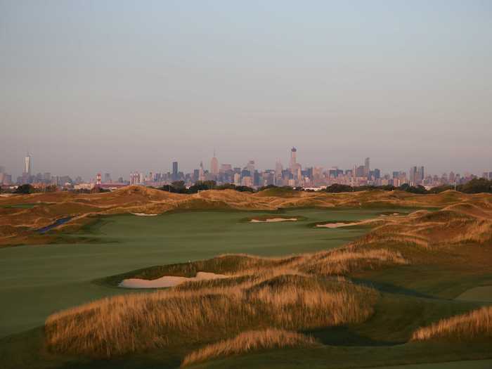 The New York City skyline is visible just beyond Trump Ferry Point. Business Insider