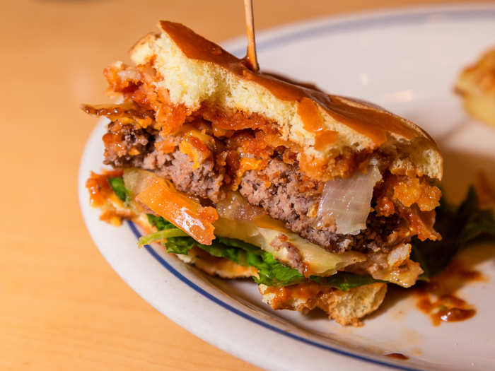 The toppings only enriched the experience. The burger was well-sauced, avoiding unnecessary messiness, and the onion rings provided a nice punch of flavor and texture. The tomatoes weren