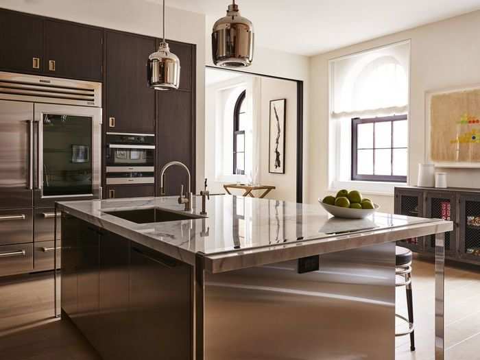 The kitchens —designed by CetraRuddy and built by cabinetmaker Christopher Peacock — include a Sub-Zero refrigerator and freezer, wine fridge, dishwasher, coffee and cappuccino maker, microwave, and high-speed oven.