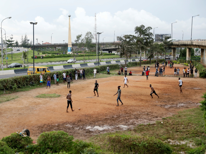 … to a dirt field in Lagos, Nigeria …