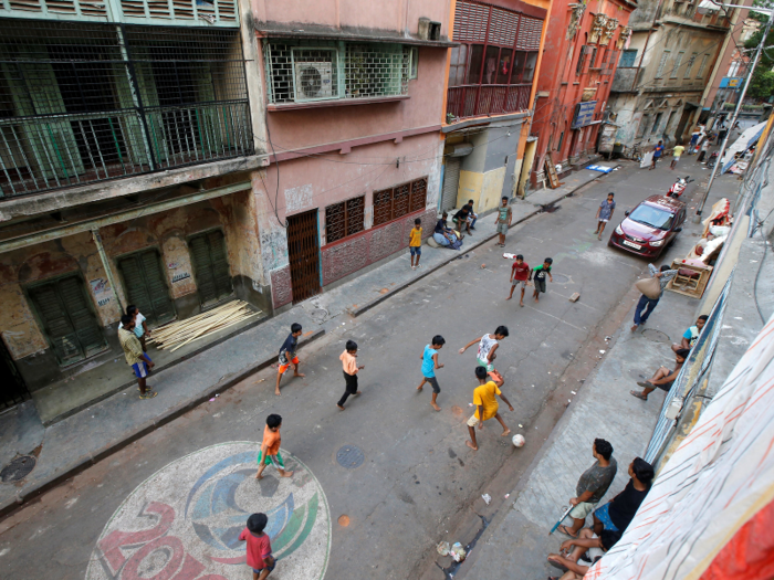 Soccer can be played on any surface, from the streets of Kolkata, India, where children play barefoot …