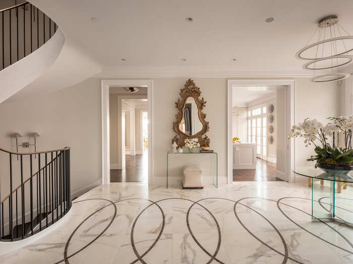 The inside is decked out with marble and crisp, white touches.