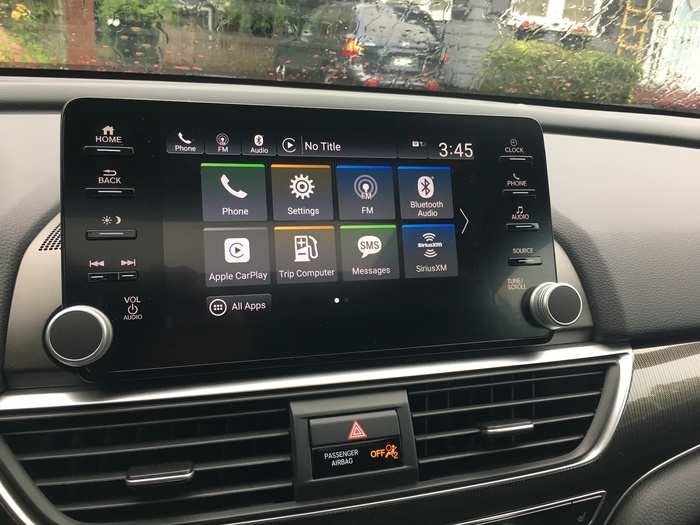 The center stack features an eight-inch touchscreen which houses the car