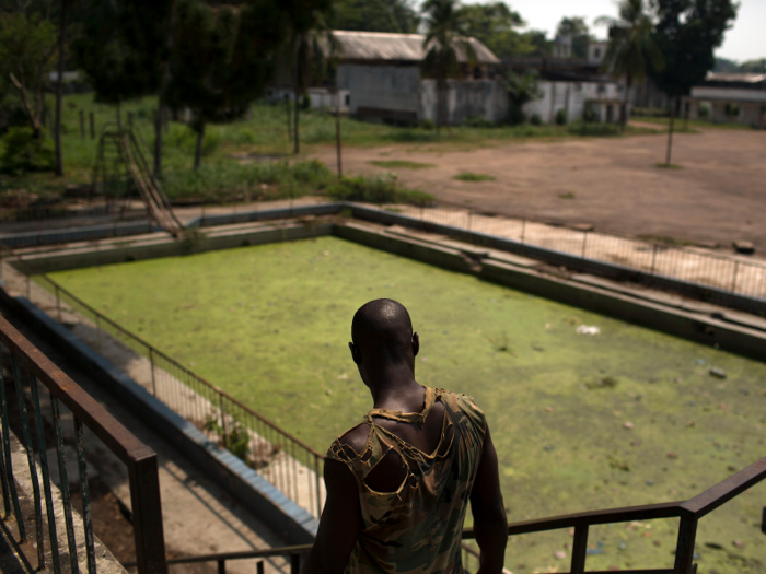 This algae-ridden pool once belonged to the Jean-Bedel Bokossa, the late ruler of the Central African Republic. Bokossa was overthrown in 1979 — the crumbling palace is now occupied by rebel soldiers.