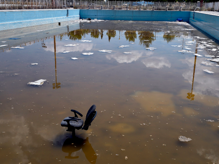 Nearby, the outdoor pool in the Olympic Village isn