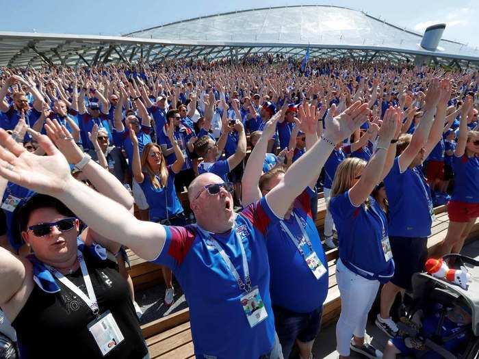 Supporters of Iceland do their Skol chant in Zaryadye Park.