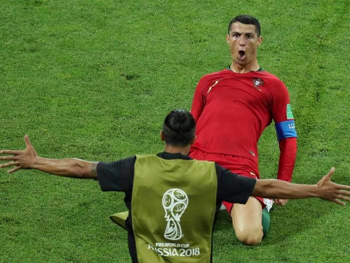 Cristiano Ronaldo celebrates one of his three goals in the opening match.