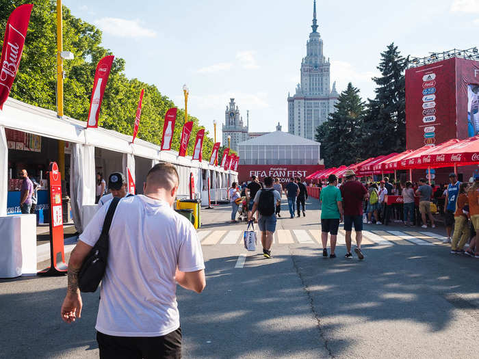 There was also a nice area to buy food and drink and enjoy it under umbrellas at some picnic tables. Surprisingly, the prices at the Fan Fest were cheaper than the street food stands outside at the park. The building in the background is Lomonosov Moscow State University, one of the city