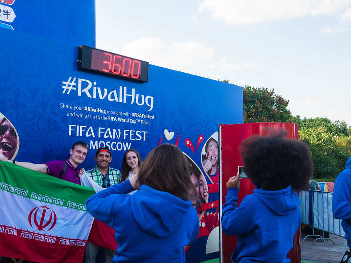 I thought this activation was a cool idea. It encouraged people to take photos with fans from a rival country and hug it out. It may be cheesy, but that