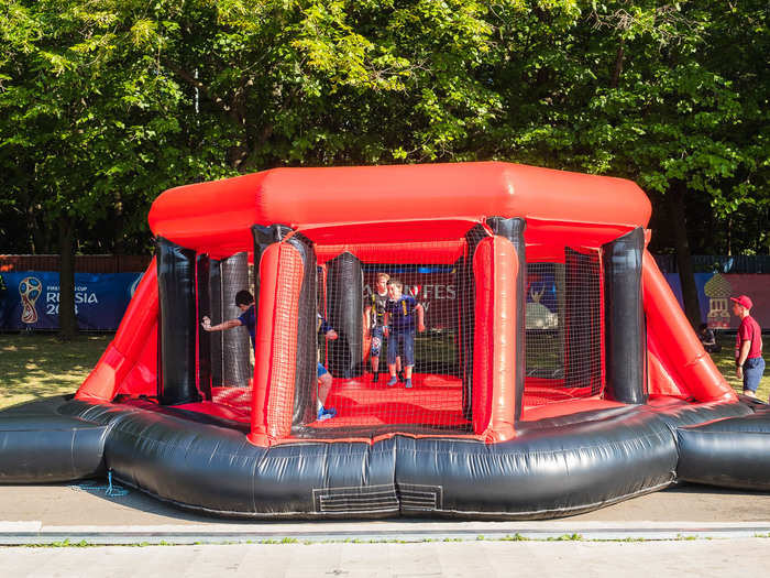 There were also a bunch of trampolines and bounce houses for kids. I was wishing that I could jump around in there, but I think I