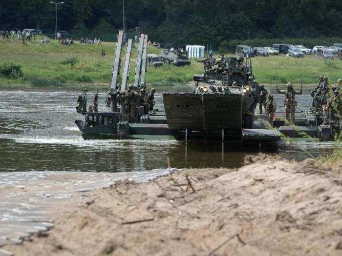 Troops from several countries practiced using M3 Amphibious Rig Bridges to get armored vehicles across rivers.