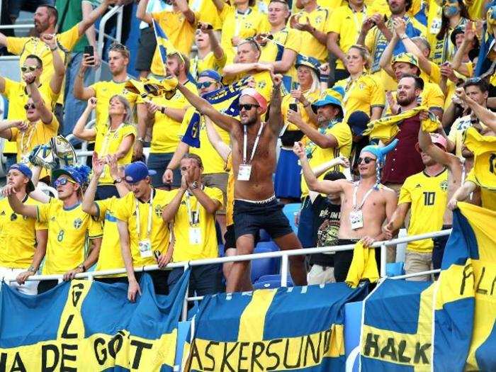 Swedish fans cheer their team on to a 1-0 victory over South Korea.
