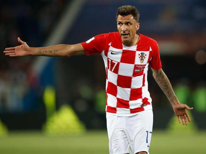 Croatian forward Mario Mandzukic pleads for his teammates to get into position during match against Nigeria.