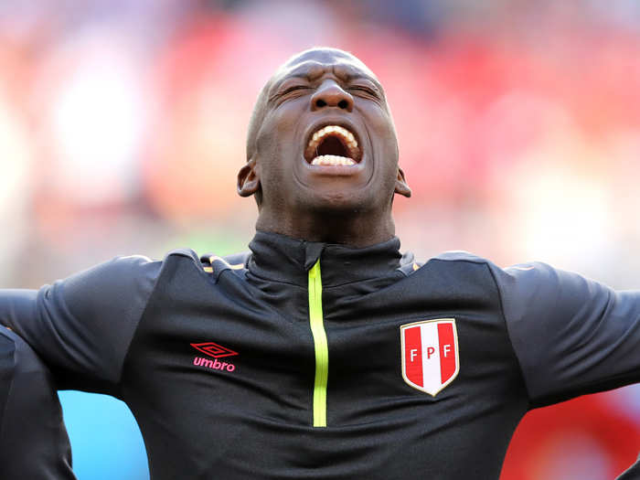 Luis Advincula of Peru belts his country