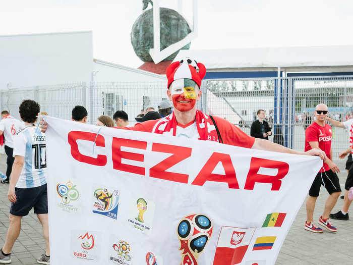 The Poland fans were dressed in full regalia, with face paint, flags, signs, and head-to-toe red.