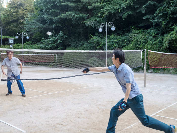 The recreational areas of Cheongdam Park offer lots of space for sports, hiking, and just taking a nap. These two guys were having a blast playing badminton.