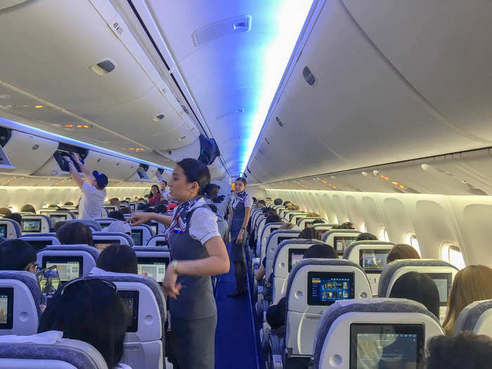 By the time I got to my seat, most people were already seated with their bags stowed in the overhead compartment. Nearly half of Air Astana