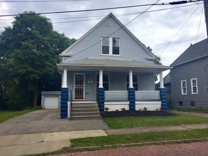 The team gutted the three-bedroom home and painted it two shades of blue.