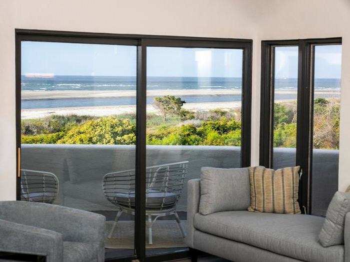 Views of the seaside can be seen from the bedroom and tub.