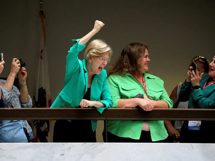 Sen. Elizabeth Warren of Massachusetts also cheered on demonstrators from above