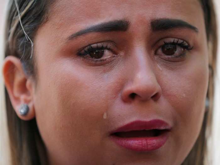 Here, Sirley Paixao, whose ten-year-old son Diego was separated from her by US immigration officials on May 24, cries while talking to reporters before the rally in Boston.