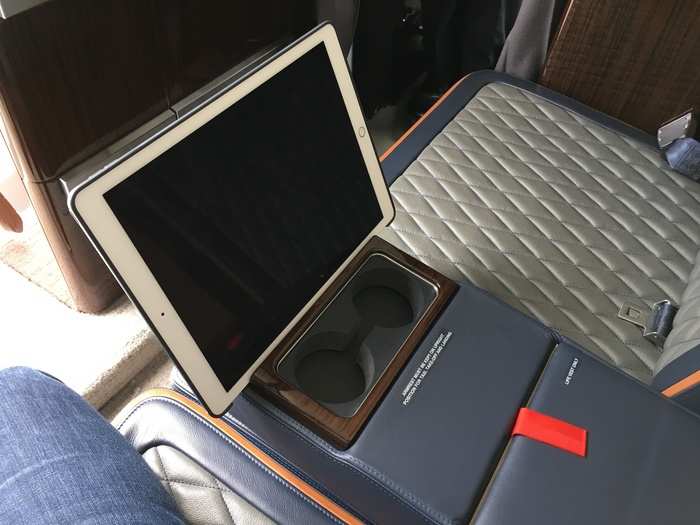 ... The divan is equipped with a fold-down armrest equipped with a slot that allows passengers to prop up tablets and smartphones. The Phenom is equipped with high-speed Wifi so passengers can stream video.