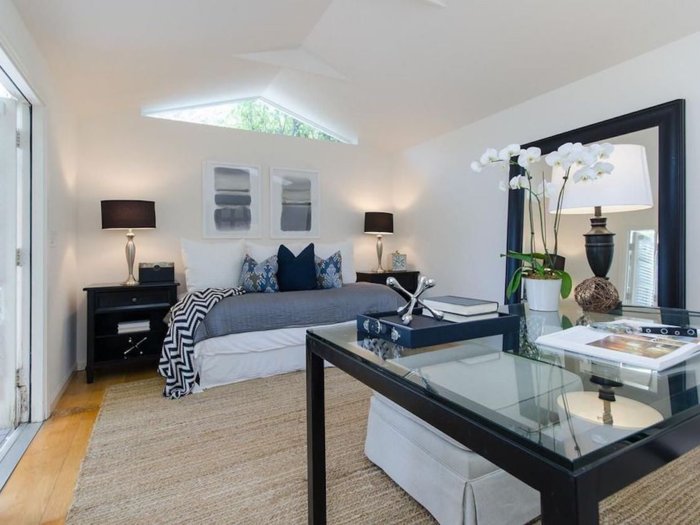 A garage was converted into an office area, so owners would have to park in tandem. The tradeoff is that there are skylights and a small seating area in the converted area.