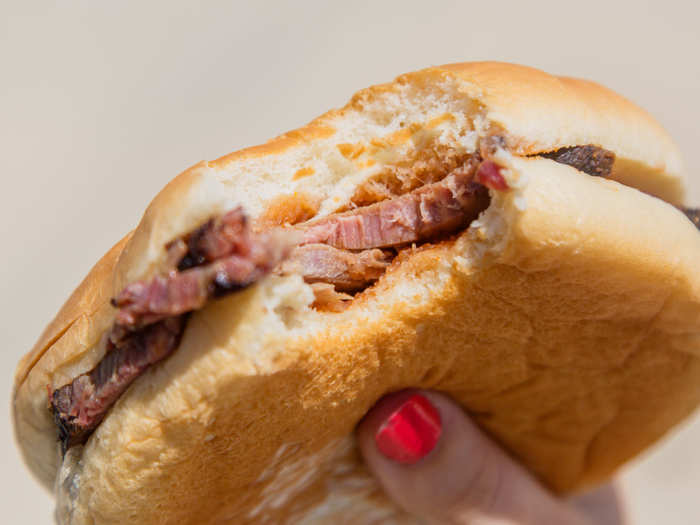 The brisket is tender and smokey, creating the base for a simple yet strong sandwich.