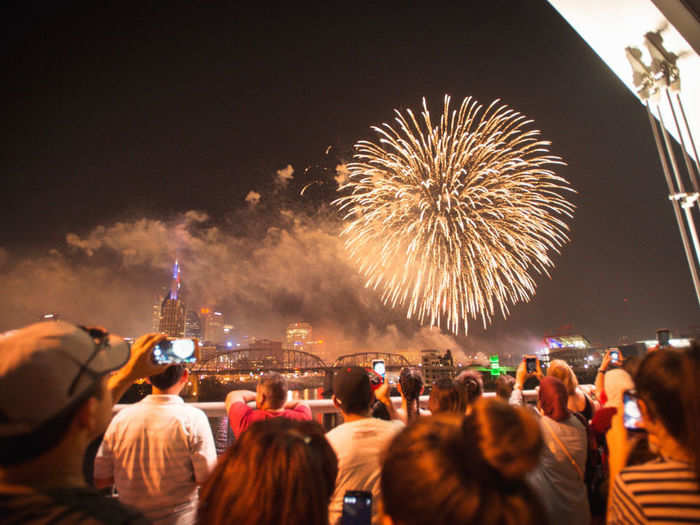 In Nashville, people gathered to watch fireworks light up the sky over Music City.