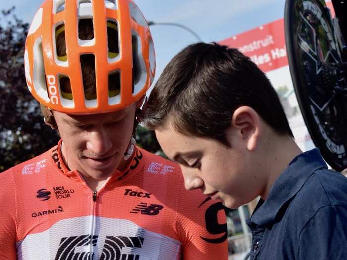 Before the pedaling got underway, American Lawson Craddock took time to meet with a fan. (Note his patriotic watch.)