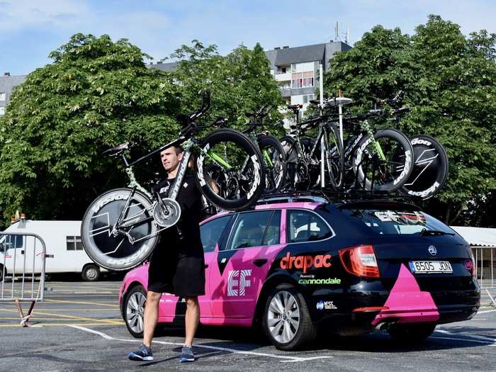 Once in Cholet, mechanic James Griffin and his team began taking the bikes down from the cars ...