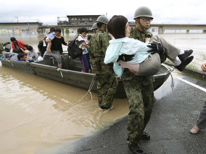 The Japan Meteorological Agency predicted that warm and damp air sliding into a seasonal front could even cause tornadoes.