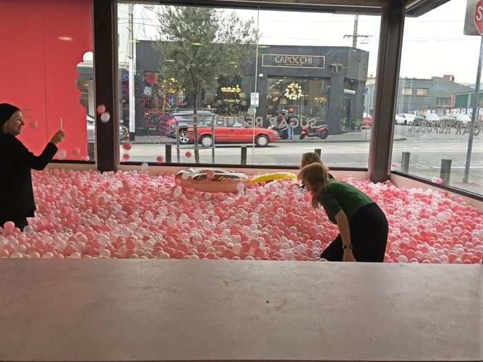 The pit features 85,000 pink balls and several rubber duckies.